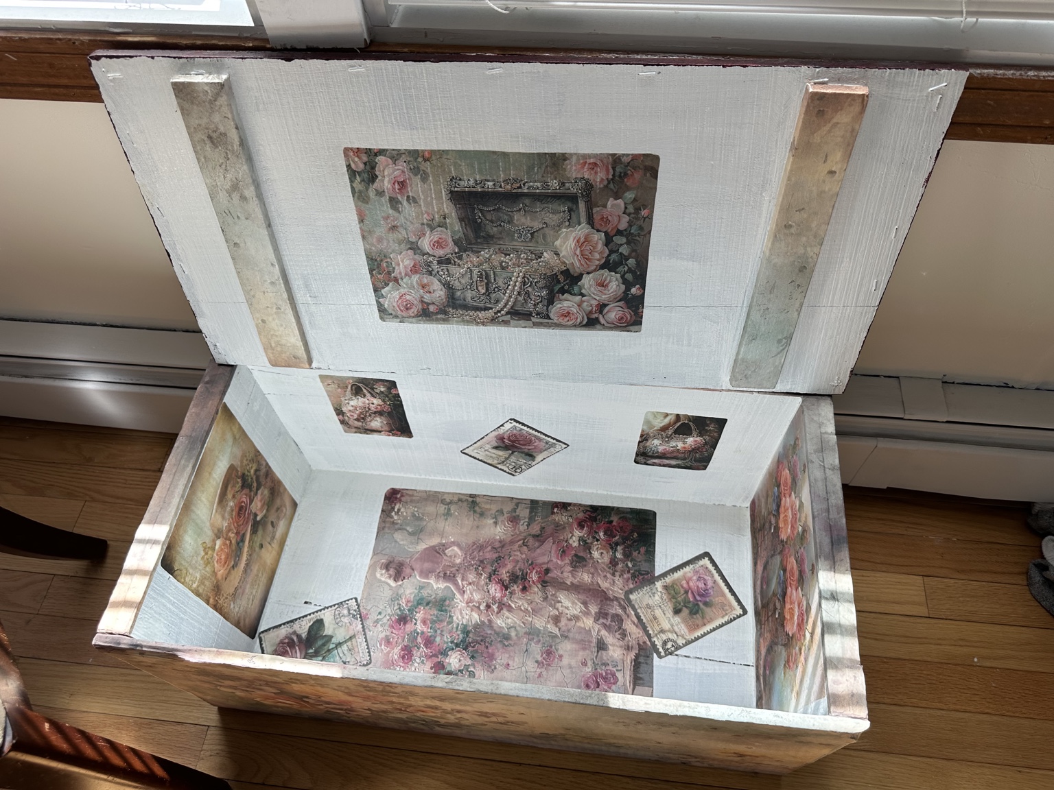 The decorated inside of the original Decoupage Studio storage box